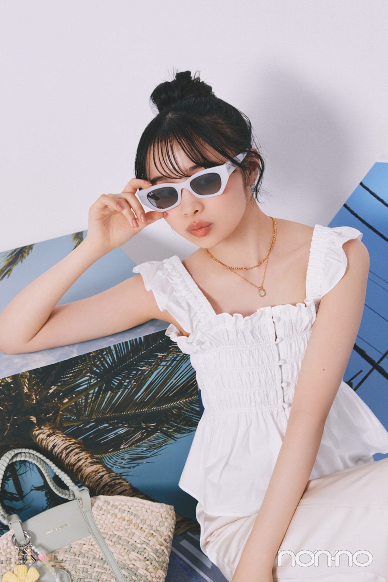 サングラスをかけた林芽亜里