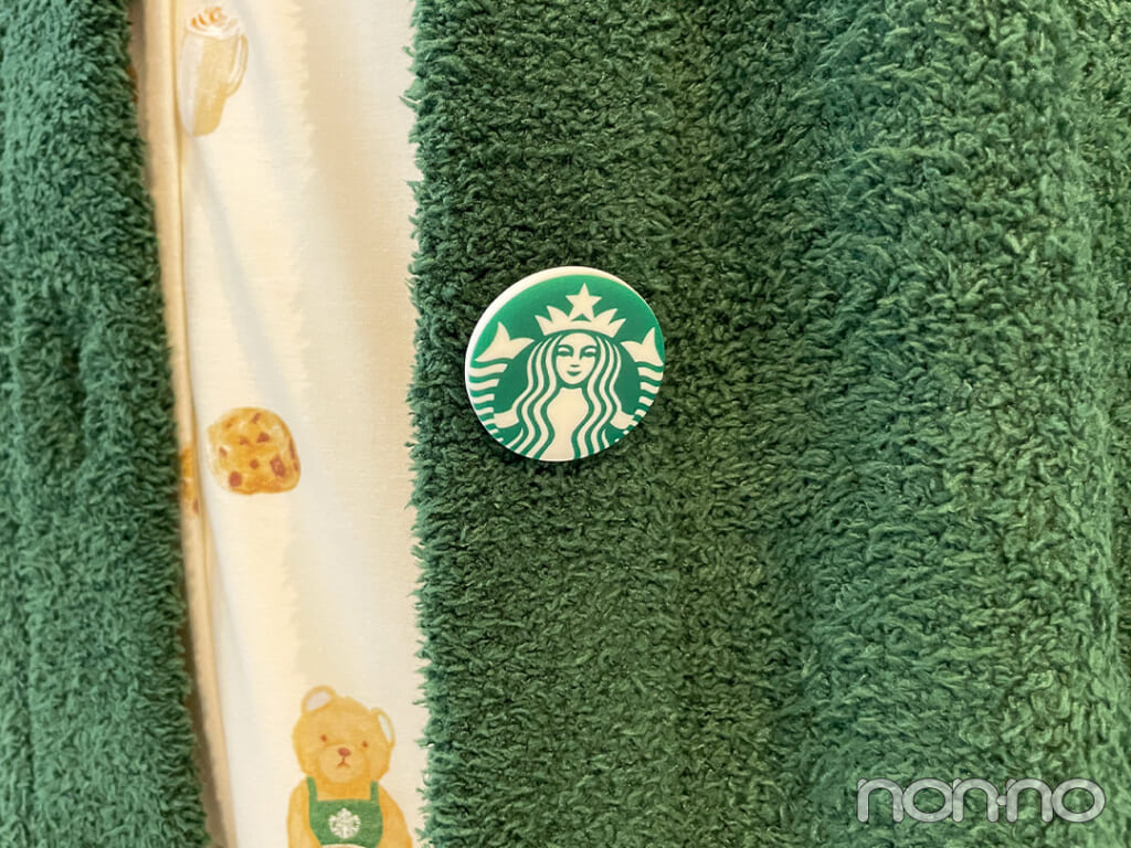 『gelato pique パウダースタージャガードカーディガン グリーン』のボタン