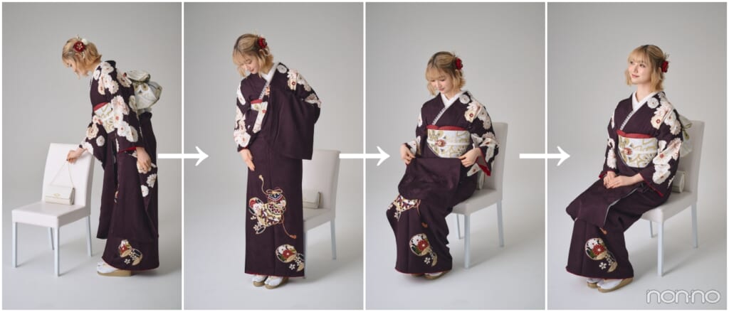 ブラウンの振袖を着た小宮山莉渚、バッグを椅子に置き、裾を折りたたみ片手にかけて座る動作