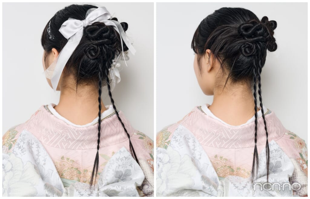 細い三つ編みを垂らし、高い位置にシニョンにまとめたヘアの後ろ姿