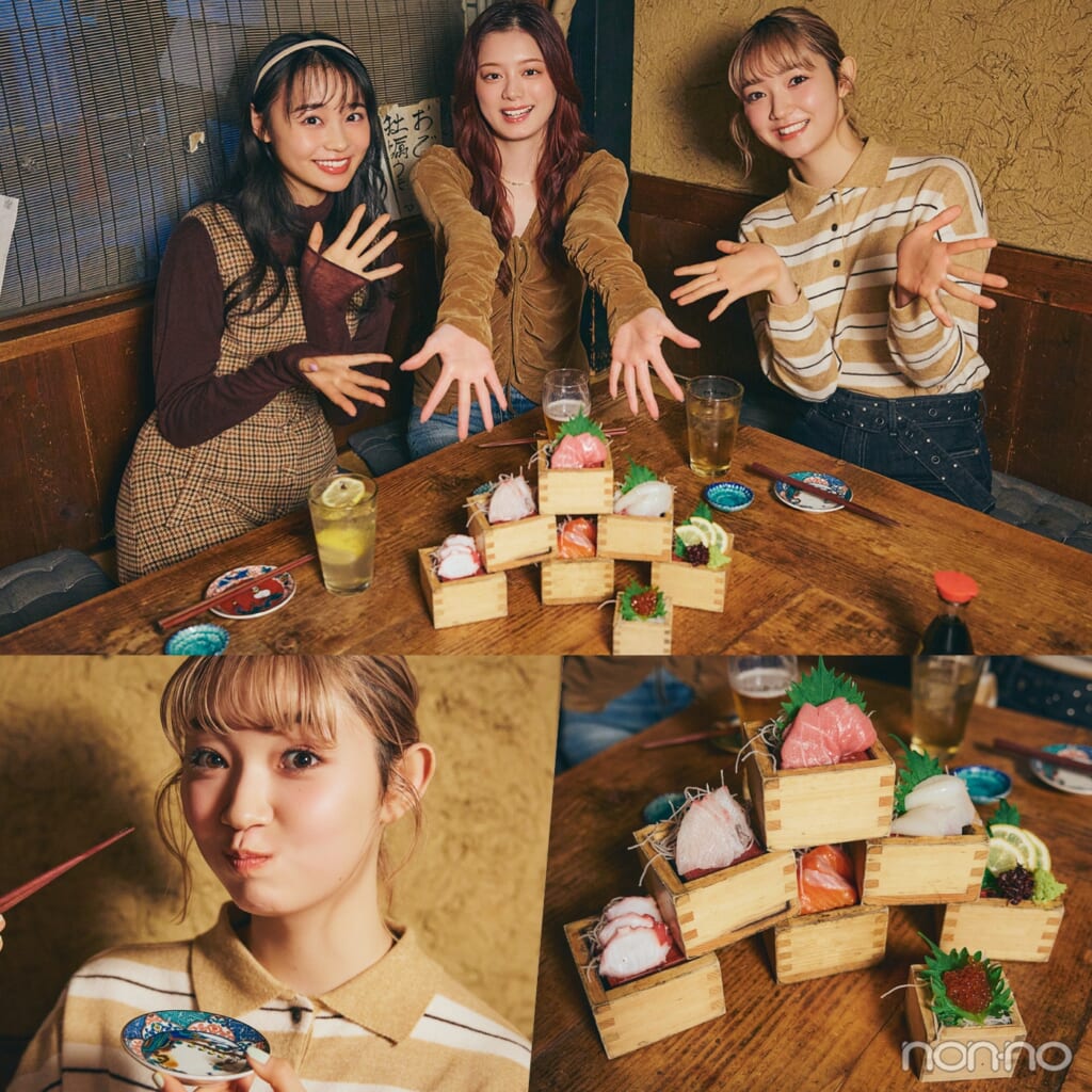 刺身の盛り合わせを前に手を広げる小宮山莉渚、紺野彩夏、林芽亜里