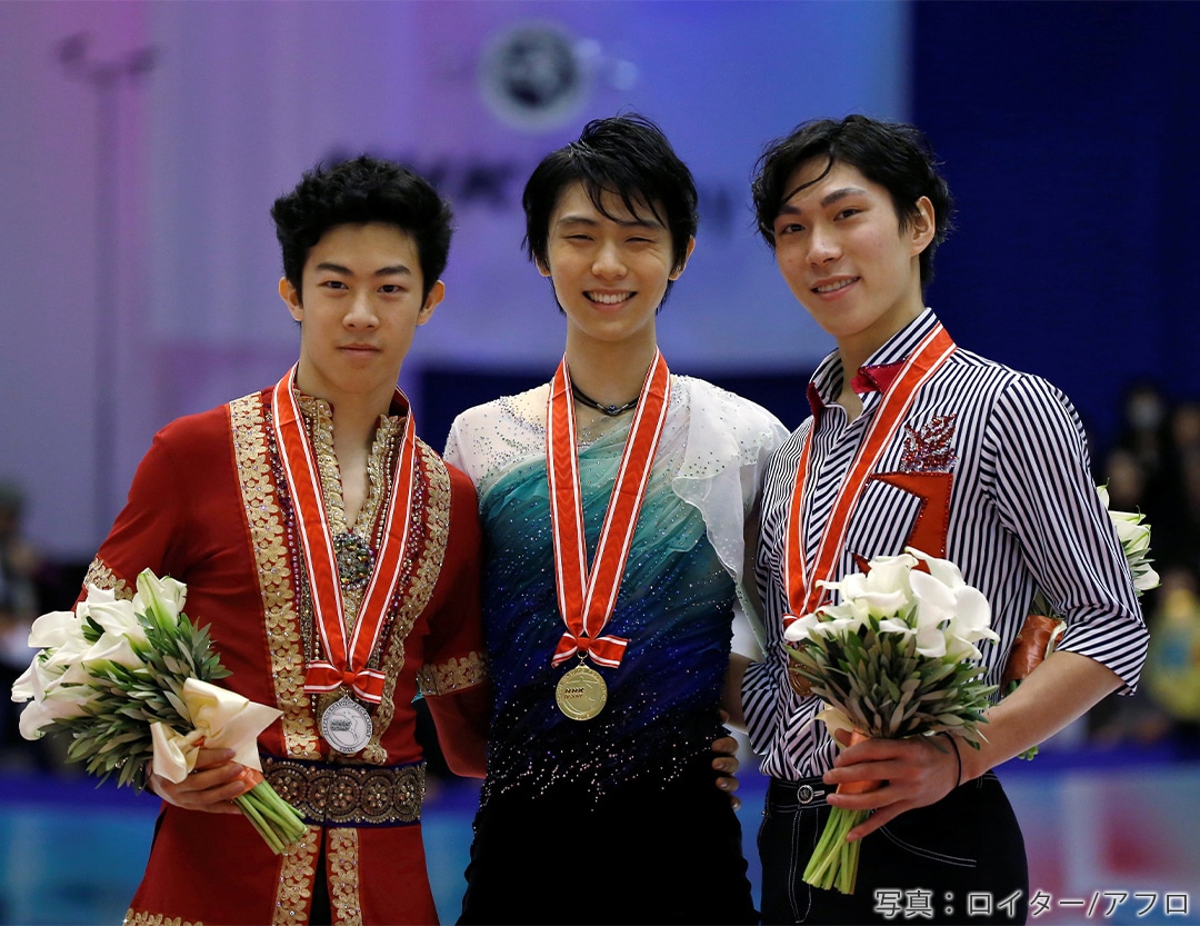 2016年グランプリシリーズNHK杯表彰式での羽生結弦選手、ネイサン・チェン選手、田中刑事選手