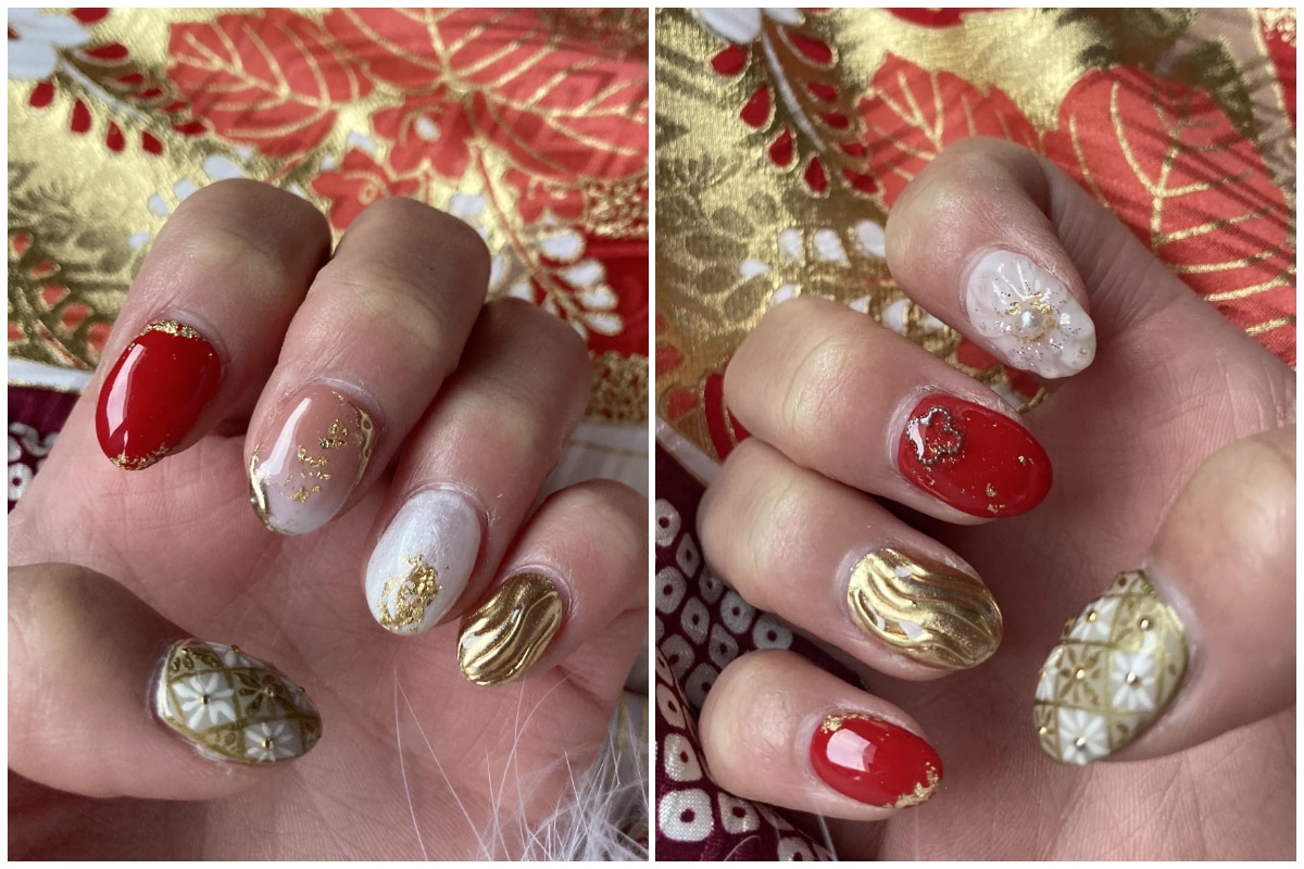 振袖を着た成人式ネイルの手元　赤とゴールドのレトロな大正ロマン風のネイルデザイン
